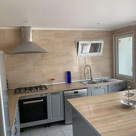 Maison *